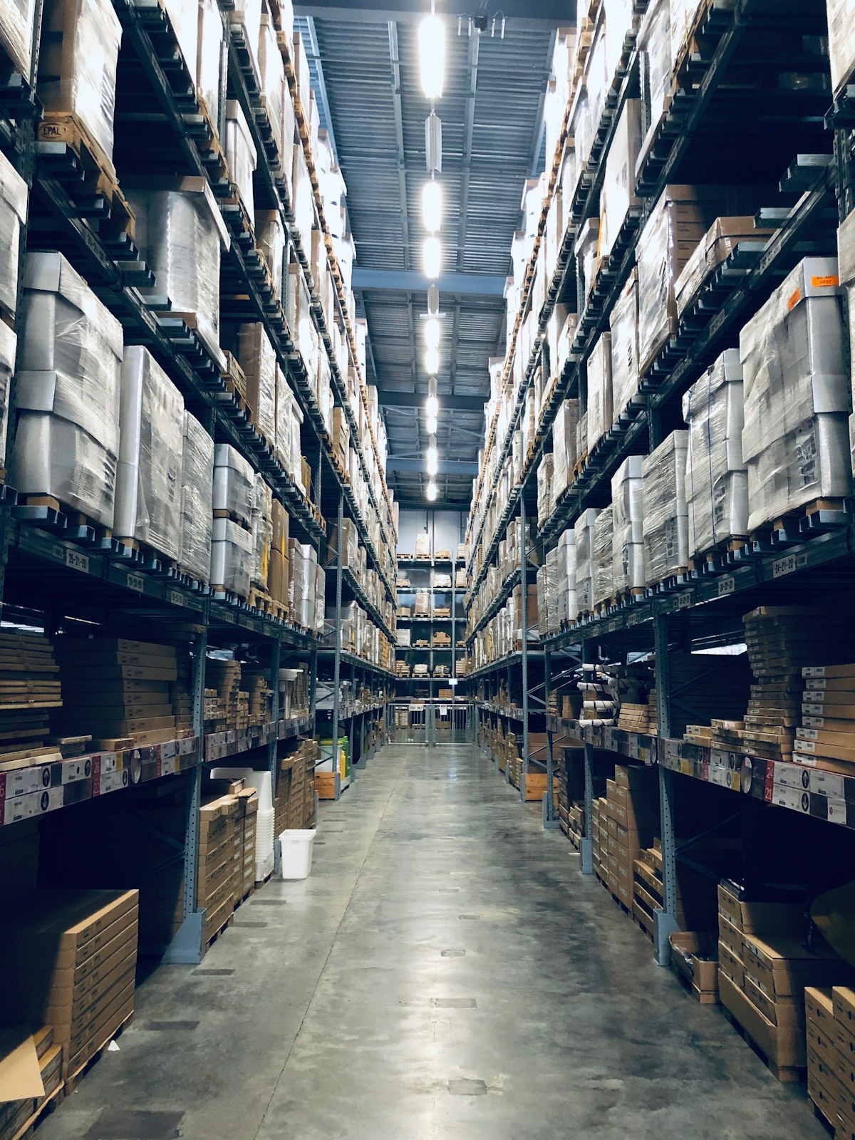 Tall warehouse racking used for organised storage