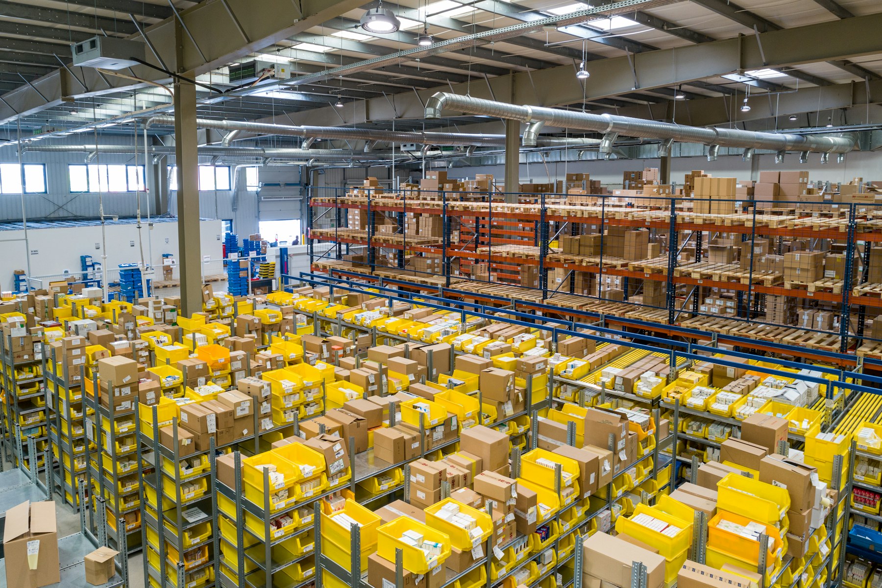 Organised warehouse shelving and storage boxes
